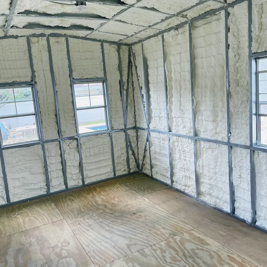 Closed-cell spray foam insulation applied to wall cavities in a residential project in Egelston