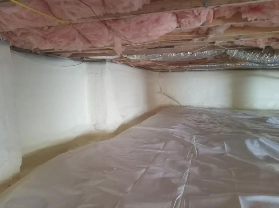Crawl space encapsulation with closed-cell spray foam for Commercial Roof Restoration in Egelston